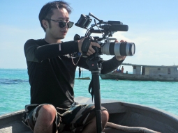 Camera man Recording Bajau Laut Documentary, near Bodgaya, Semporna, Malaysia